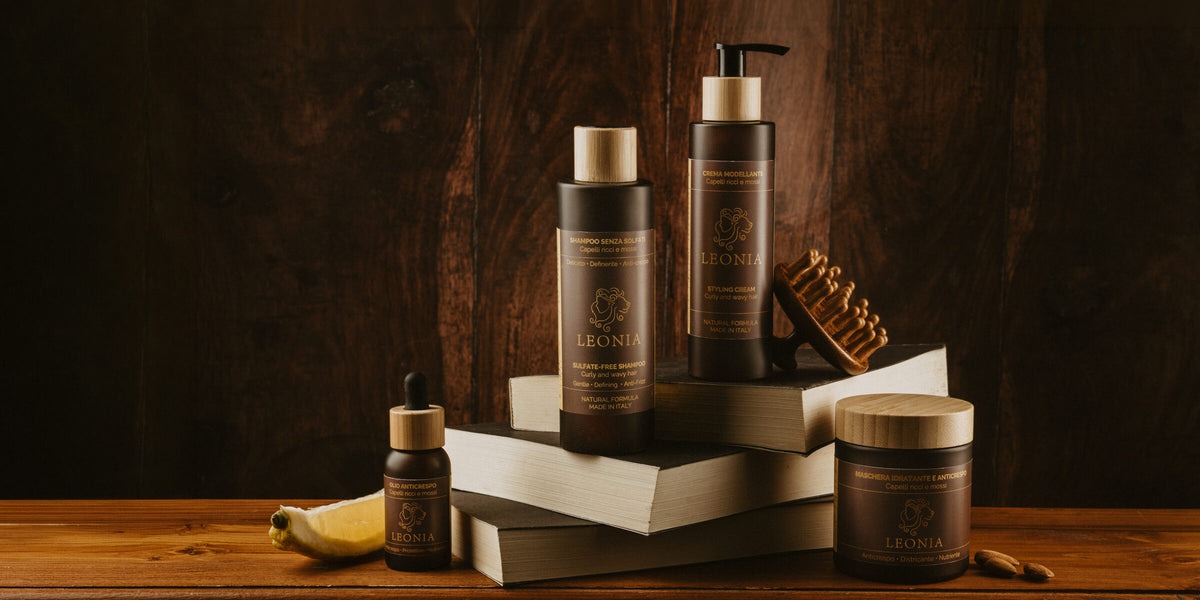 Rituale Completo Salva-Ricci LEONIA: shampoo, crema styling, olio, maschera e spazzola sui libri